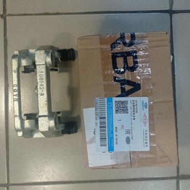 Скоба заднего суппорта лев Geely X7