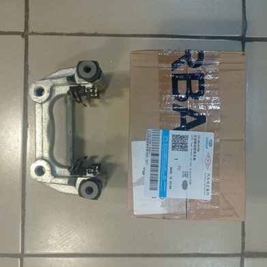 Скоба заднего суппорта лев Geely X7